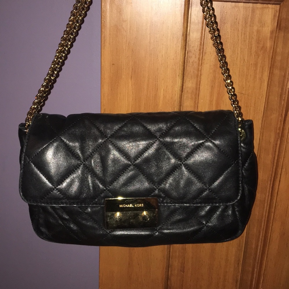 Authentic black quilted Michael Lora shoulder bag